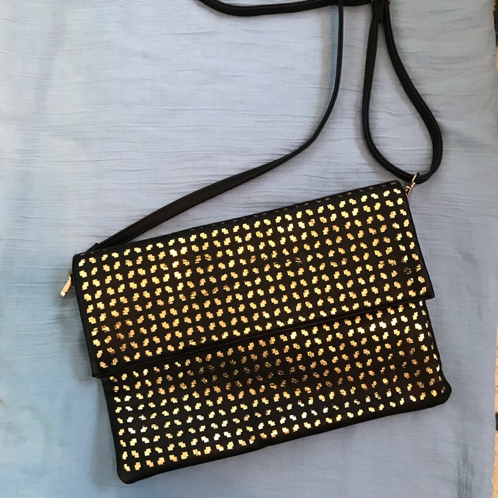 Brand New Torrid Black laser cut design over gold